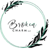 Broken Charm LLC circular logo with green ring and leaf design