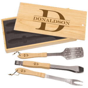 Three piece barbecue tool set with bamboo handles and engraved wooden pine box lid