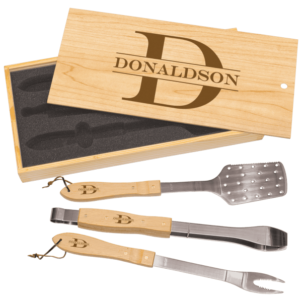Three piece barbecue tool set with bamboo handles and engraved wooden pine box lid