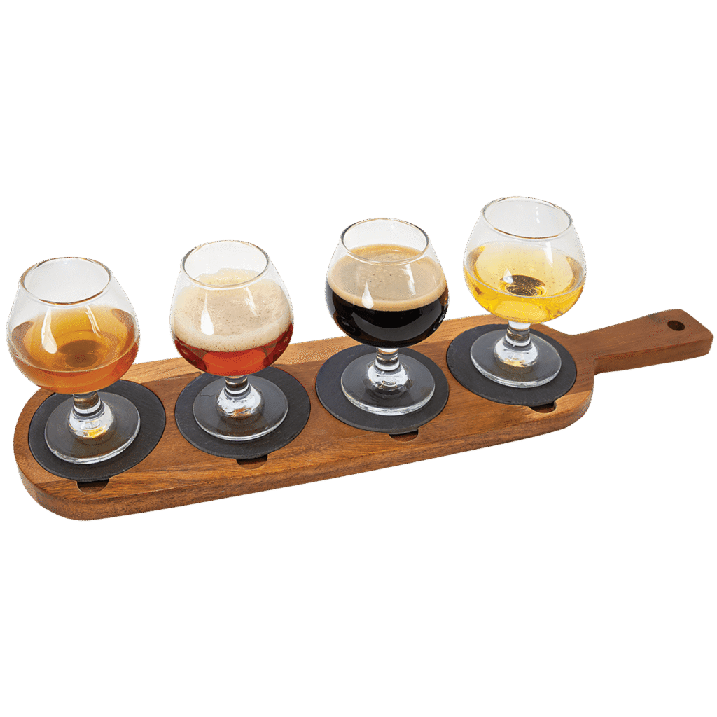 Acacia wood serving board with slate coasters holding tasting glasses for entertaining