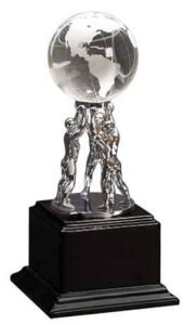 Custom engraved crystal globe award with silver figure on black piano finish base