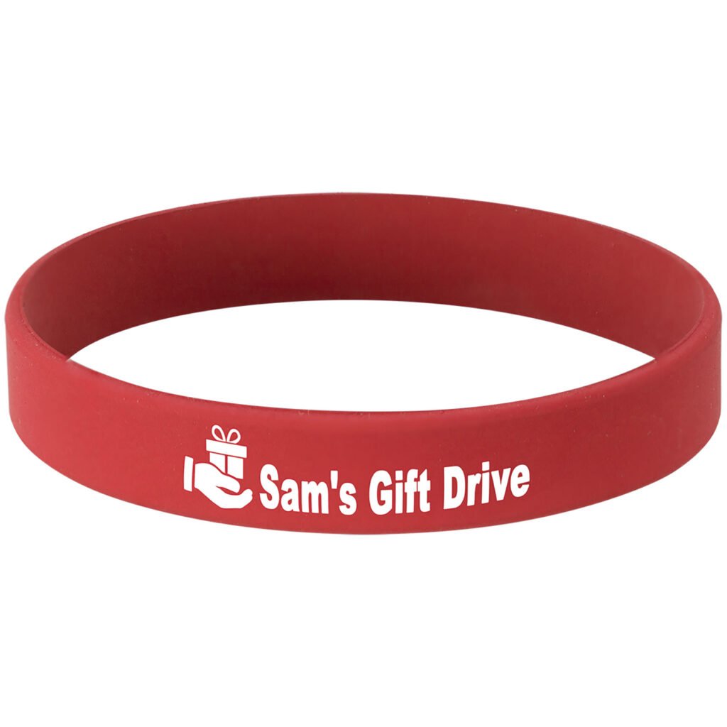 Red and white laser engraved bracelet featuring Sam’s Gift Drive with a gift icon